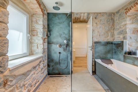 Deluxe Double Room | Bathroom | Shower, rainfall showerhead, hair dryer, heated floors