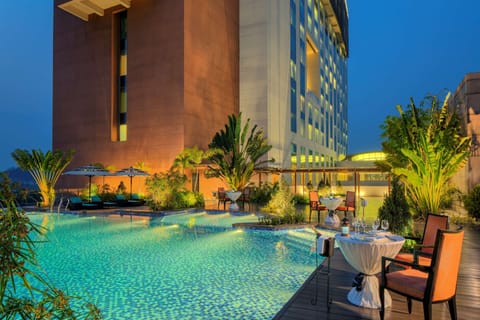Outdoor pool, pool umbrellas, sun loungers