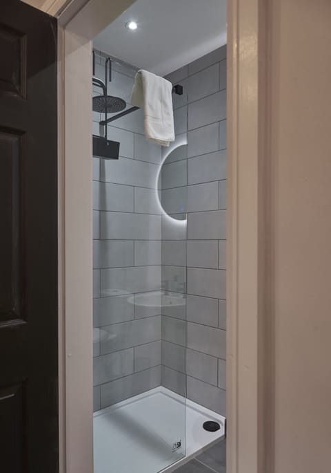 Shower, towels, soap, shampoo