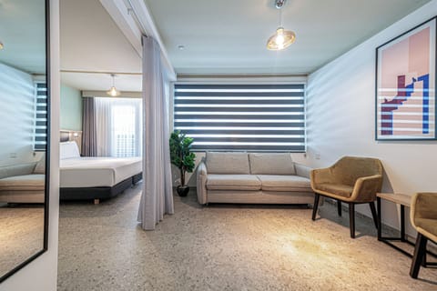 Junior Suite | Down comforters, minibar, in-room safe, desk