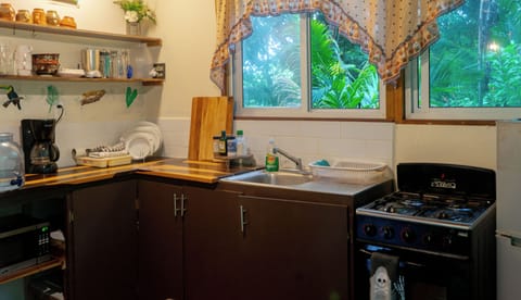 Romantic Cabin, 1 Bedroom, Garden View, Garden Area | Pillowtop beds, individually decorated, individually furnished