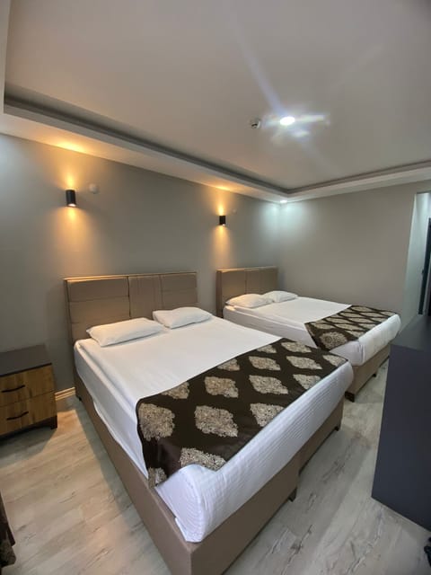 Family Room | Premium bedding, minibar, free WiFi, bed sheets