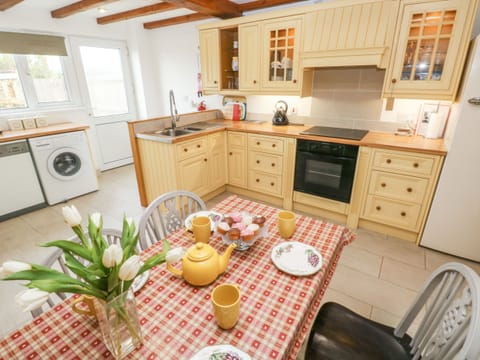 Fridge, electric kettle, toaster, cookware/dishes/utensils