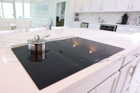 Condo, 4 Bedrooms | Private kitchen | Fridge, oven, coffee/tea maker