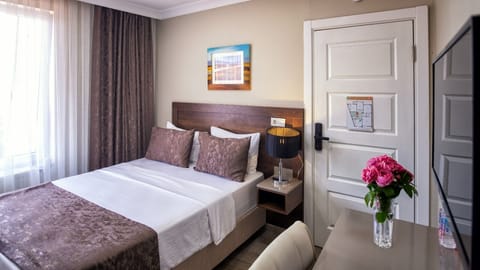 Double Room | Free minibar items, in-room safe, desk, laptop workspace