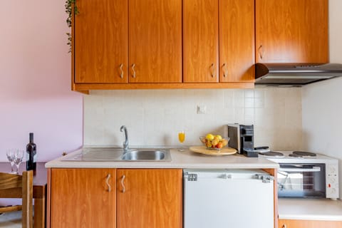 Suite, 2 Bedrooms (for 6) | Private kitchen | Fridge, microwave, stovetop, coffee/tea maker