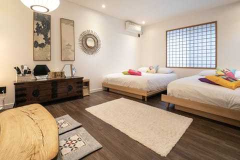 Luxury Quadruple Room, 2 Queen Beds, Private bathroom outside the room | Individually decorated, individually furnished, iron/ironing board