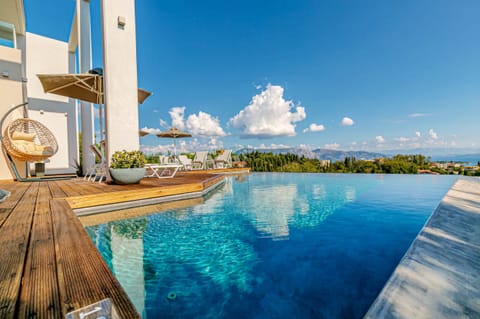 Seasonal outdoor pool, pool umbrellas, sun loungers