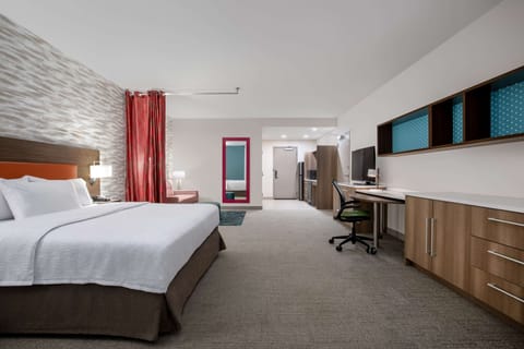 Desk, laptop workspace, blackout drapes, iron/ironing board