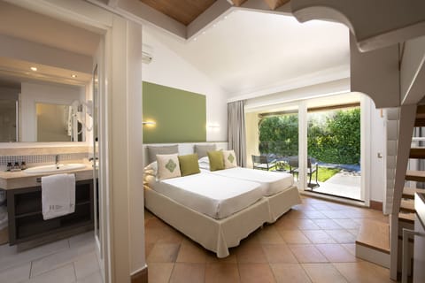 Family Garden Room | 1 bedroom, minibar, in-room safe, blackout drapes