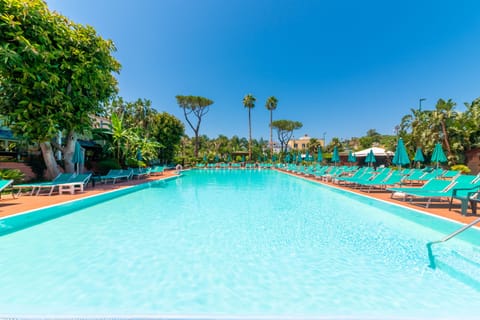 Indoor pool, outdoor pool, open 8:00 AM to 7:00 PM, pool umbrellas