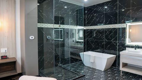 Desk, laptop workspace, blackout drapes, iron/ironing board