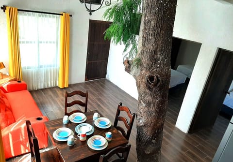 Deluxe Apartment | Living area | 32-inch LED TV with satellite channels, TV