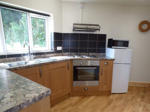 Fridge, electric kettle, toaster, cookware/dishes/utensils