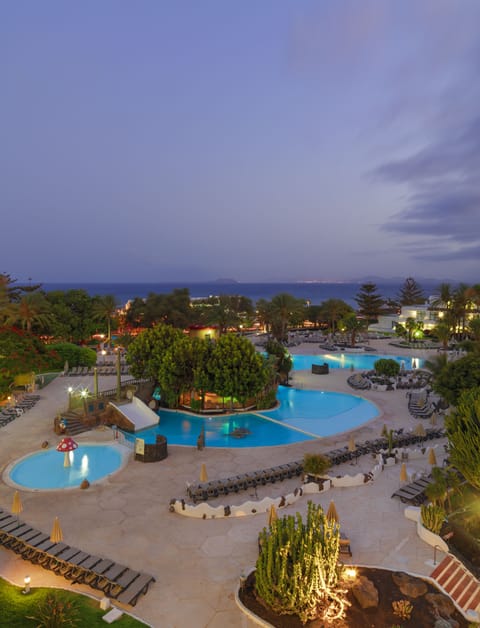 Indoor pool, 2 outdoor pools, pool umbrellas, sun loungers