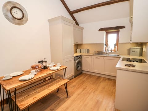 Fridge, electric kettle, toaster, cookware/dishes/utensils