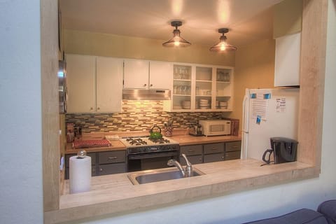 Condo, 3 Bedrooms | Private kitchen | Fridge, coffee/tea maker, toaster