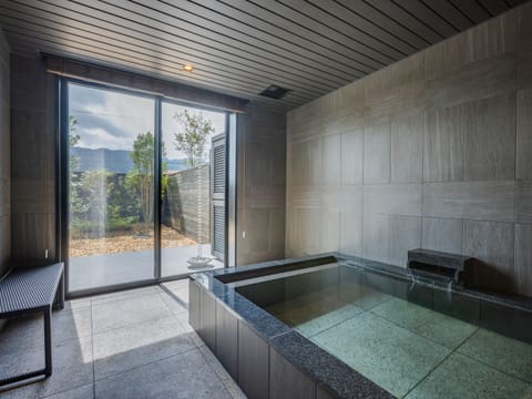 Premium Suite, Private Bathroom, Garden View (Dog Friendly) | Bathroom | Combined shower/tub, spring water tub, free toiletries, hair dryer