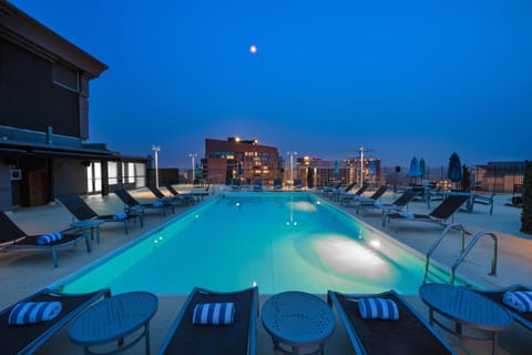 Seasonal outdoor pool, open 11:00 AM to 7:00 PM, sun loungers