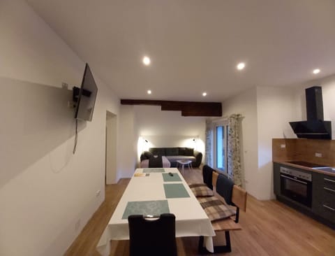 Comfort Apartment | Living area | 48-cm TV with satellite channels, foosball, streaming services