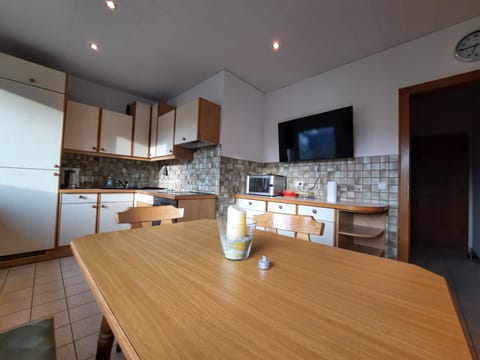 Apartment, 1 Bedroom, Balcony | Private kitchen | Microwave, cleaning supplies, dining tables