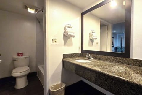 Room, 1 King Bed, Smoking | Bathroom | Free toiletries, hair dryer, towels