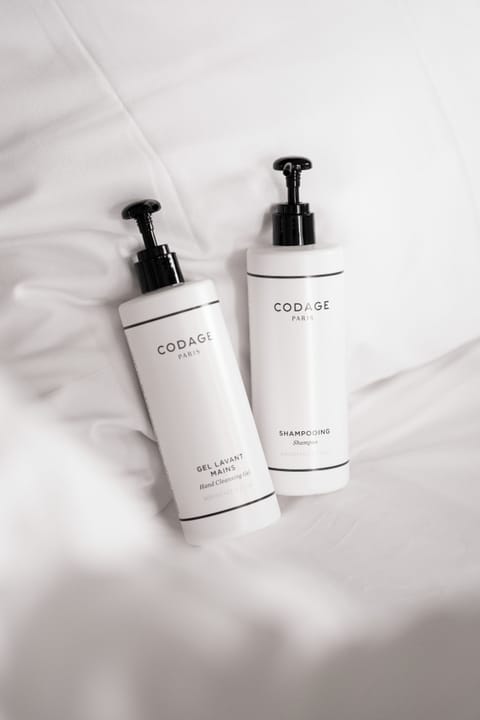 Eco-friendly toiletries, hair dryer, bathrobes, towels