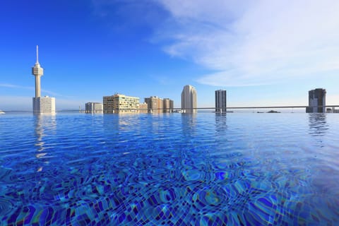 Outdoor pool, open 7:00 AM to 8:00 PM, pool umbrellas, sun loungers