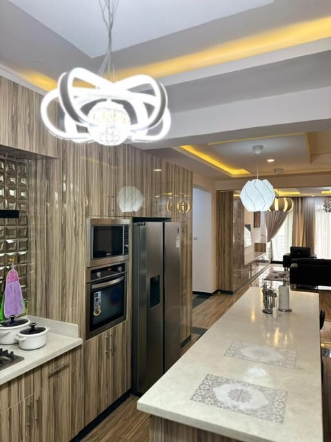 Luxury Apartment, Non Smoking, Ensuite | Private kitchen | Full-size fridge, microwave, oven, stovetop