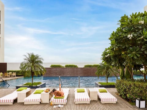 Outdoor pool, pool umbrellas, sun loungers