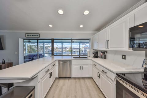 House, Multiple Beds, Pool Access, Garden View (Waterfront Pool House) | Private kitchen | Fridge, microwave, oven, stovetop