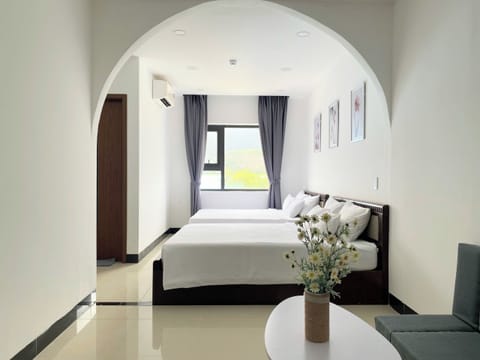 Family Quadruple Room | Down comforters, Select Comfort beds, minibar, blackout drapes