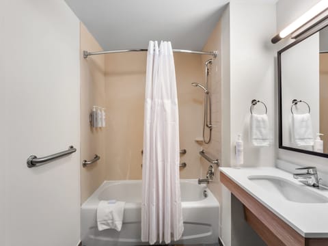 Desk, laptop workspace, blackout drapes, iron/ironing board