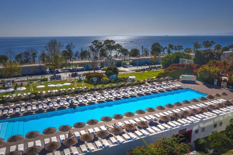 Indoor pool, seasonal outdoor pool, pool umbrellas, sun loungers