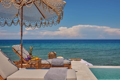 Seasonal outdoor pool, pool umbrellas, sun loungers