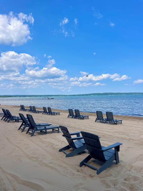 Private beach, white sand, sun loungers, beach towels