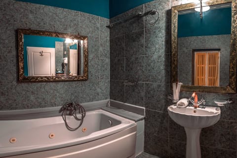 Muses Suite - 21 | Bathroom | Free toiletries, hair dryer, slippers, towels