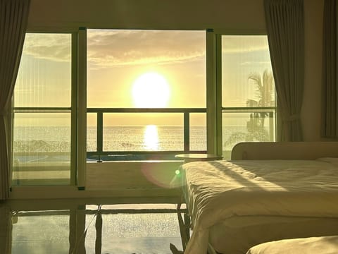 Deluxe Quadruple Room, Multiple Beds, Sea View | Desk, laptop workspace, blackout drapes, soundproofing
