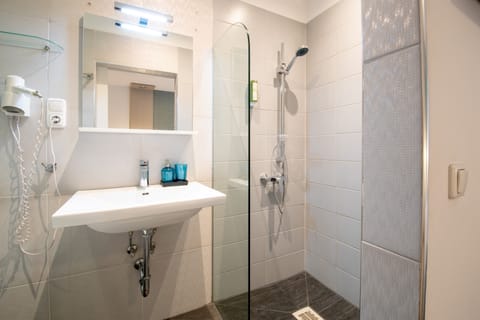 Shower, towels, soap, shampoo