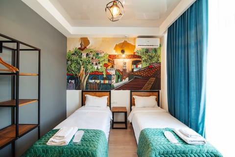 Standard Twin Room, 2 Twin Beds | Individually decorated, desk, laptop workspace, free WiFi