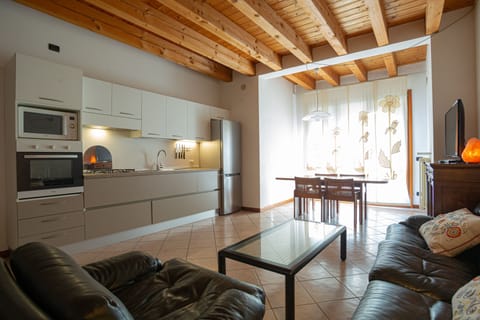 Comfort Apartment | Private kitchen | Full-size fridge, microwave, oven, stovetop