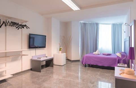 Premium bedding, down comforters, memory foam beds, desk