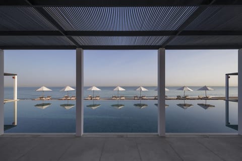 3 outdoor pools, open 8 AM to 6 PM, free cabanas, pool umbrellas