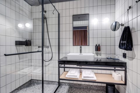 Premium bedding, down comforters, pillowtop beds, minibar