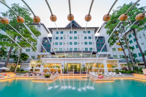 Outdoor pool, open 7:00 AM to 11:00 PM, pool umbrellas, sun loungers