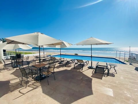 Comfort Condo | Living area | 30-inch TV with cable channels