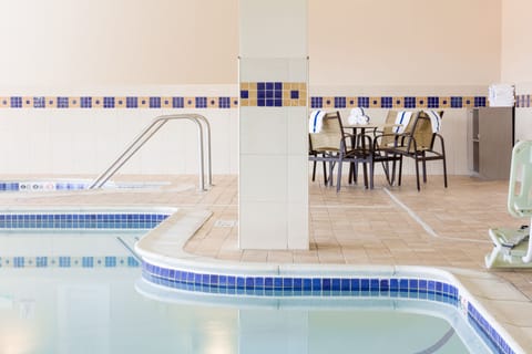 Indoor pool, open 6:00 AM to 11:00 PM, sun loungers