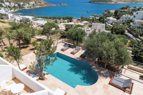 Seasonal outdoor pool, open 11:00 AM to 8:00 PM, sun loungers