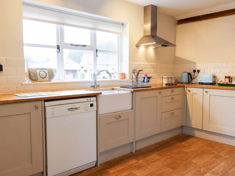 Fridge, electric kettle, toaster, cookware/dishes/utensils