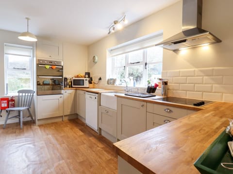 Fridge, electric kettle, toaster, cookware/dishes/utensils